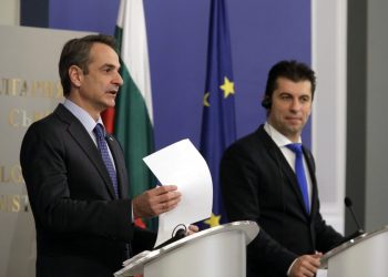 Greek Prime Minister Kyriakos Mitsotakis, left, speaks during joint press conference with his Bulgarian counterpart Kiril Petkov after their meeting in Sofia, Monday, Dec. 20, 2021. Mitsotakis is paying his first visit to Bulgaria and this is also the first official visit Bulgaria's new prime minister hosts. (AP Photo/Valentina Petrova)