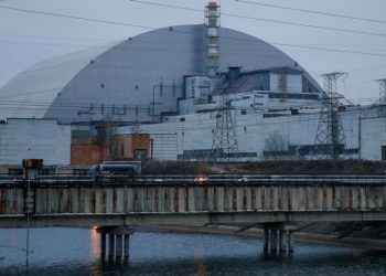 FILE PHOTO: A general view shows the New Safe Confinement (NSC) structure over the old sarcophagus covering the damaged fourth reactor at the Chernobyl Nuclear Power Plant, in Chernobyl, Ukraine November 22, 2018. Picture taken November 22, 2018.  REUTERS/Gleb Garanich/File Photo