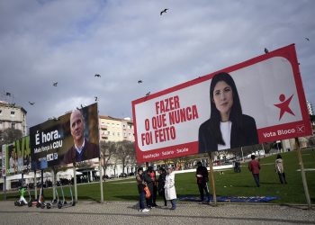 Birds fly above election campaign billboards for leftist parties in Lisbon, Portugal, Saturday, Feb. 24, 2024. The official two-week campaign period before Portugal's snap general election begins Feb. 25, with the country's two moderate mainstream parties once again expected to collect most votes but with the possible rise of a populist party potentially adding momentum to Europe's drift to the right. (AP Photo/Armando Franca)