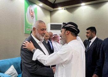 Ismail Haniyeh, top leader of the Palestinian Islamist group Hamas, meets a person offering condolences after the killing of three of his sons in an Israeli strike in Gaza City, in Doha, Qatar April 11, 2024. REUTERS/Ibraheem Abu Mustafa