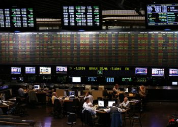 Traders work on the floor of the Buenos Aires Stock Exchange, October 2, 2014. Argentine stocks and bonds fell sharply on Thursday as the government left markets guessing about policy direction after the appointment of a new central bank chief viewed as sympathetic to the government's ramped-up interventions in the economy. 
  REUTERS/Marcos Brindicci (ARGENTINA - Tags: POLITICS BUSINESS) - RTR48QFO