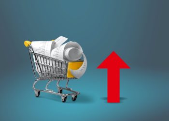 Shopping cart with cardboard boxes and red up arrow. Growth wholesale and retail. Improving consumer sentiment, economic growth. Rising prices for goods, inflation. growth of popularity of the product