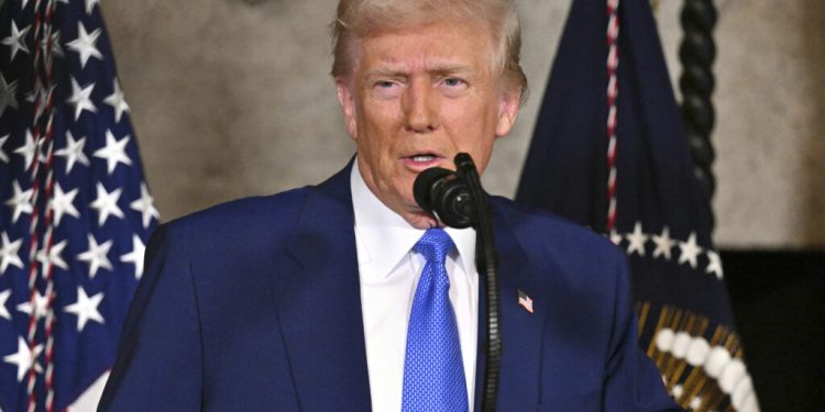 President Donald Trump speaks at Mar-a-Lago in Palm Beach, Fla., Tuesday, Feb. 18, 2025. (Pool via AP)