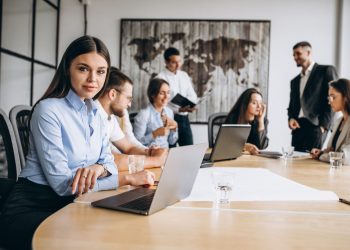 Group of people working out business plan in an office